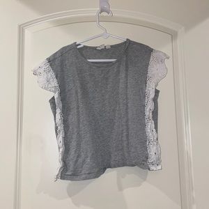 Gray and White tee floral design on side.